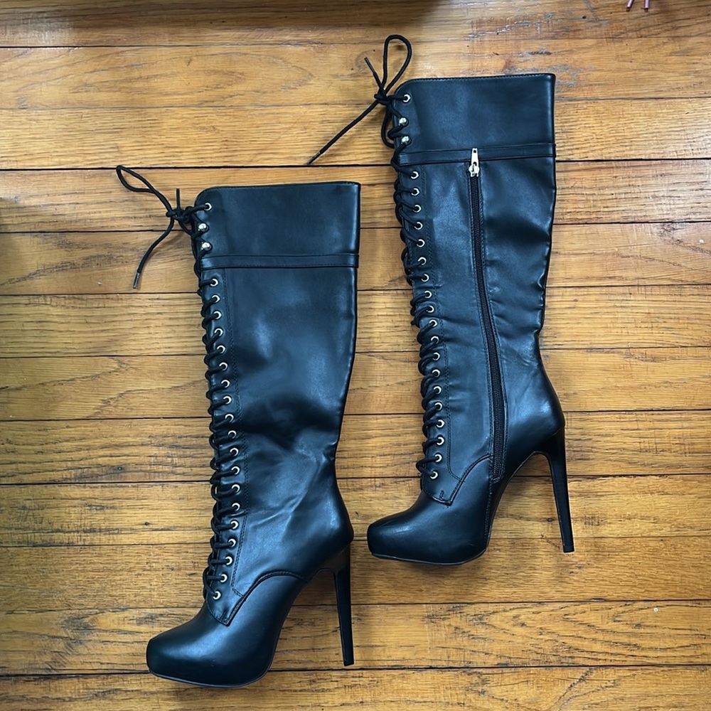 High heel lace up boots, size 7.